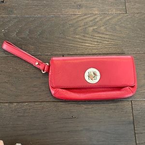 Red Kate Spade wristlet (never used)